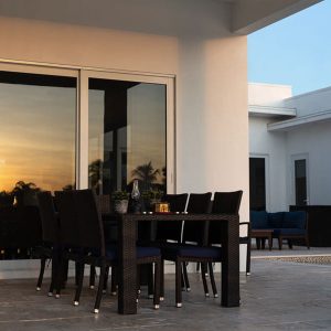 outdoor patio image with full windows in background