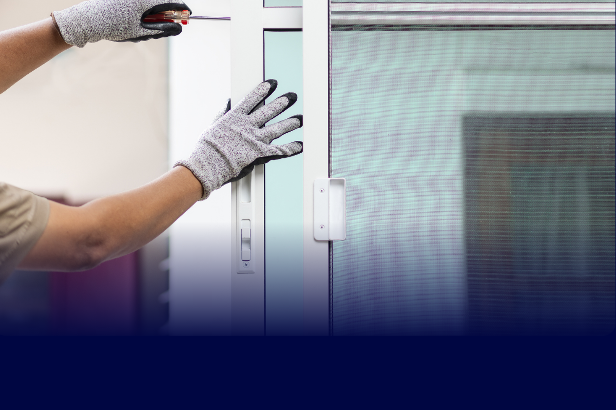 Worker doing window maintenance